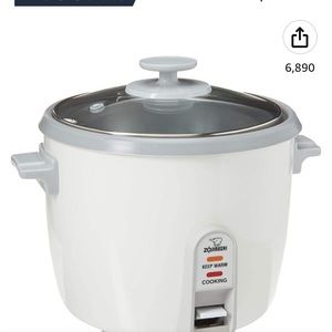 - New!Rice cooker/Steamer/w keep warm- new still in box by zojirushi